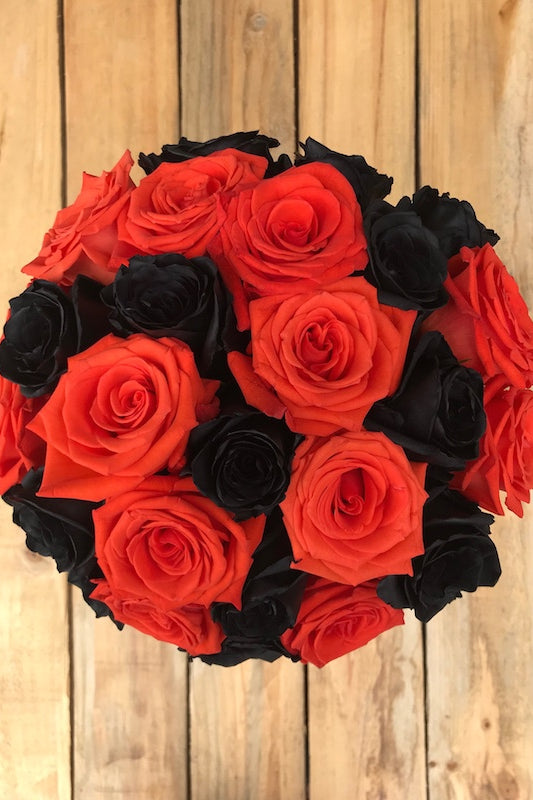 Orange and Tinted Black Roses