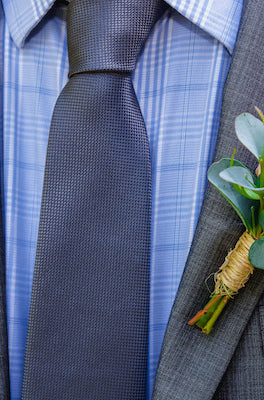 single rose hypericum eucalyptus boutonniere