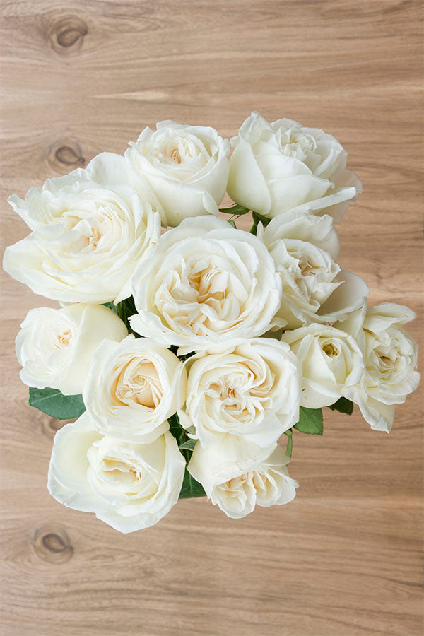 https://flowerexplosion.com/cdn/shop/products/roses_15_wood_topview.jpg?v=1658374924